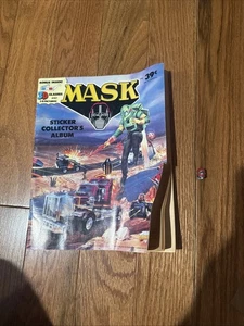 M.A.S.K. Libro de pegatinas Matt Trakker versión máscara corta Kenner vintage 1985 raro - Imagen 1 de 5