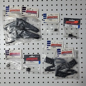 Duratrax Parts Lot ~ 8 Items ~ Thunder Quake ~ Vintage NIP NOS RC - Picture 1 of 7