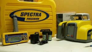 TRÍPODE Y VARILLA Trimble Spectra Precision LL300N HL450 y baterías recargables - Imagen 1 de 3