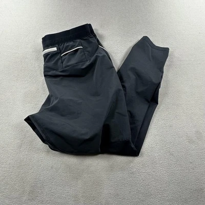 Calça Nike masculina XL preta flexível tecnologia utilitária corrida reflexiva AJ7959 - Imagem 1 de 4