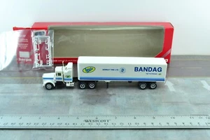 Herpa 390002 BANDAG Kenworth Tractor Trailer Truck 1:87 - Picture 1 of 3