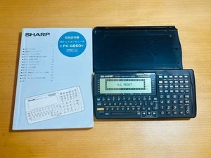 Sharp Pocket Computer PC-G850V Kalkulator funkcyjny z instrukcją obsługi - Zdjęcie 1 z 2