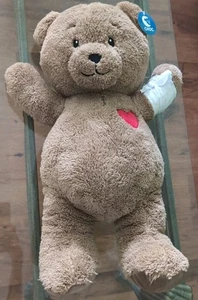 With Tag - Choc: 21" brown Teddy Bear With Bandaged Arm, Heart & Logo On Foot - Picture 1 of 7