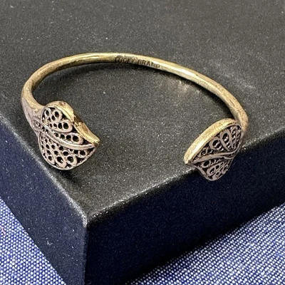 Bracelt brazalete dorado marca Lucky en cada extremo Foto 1 de 4