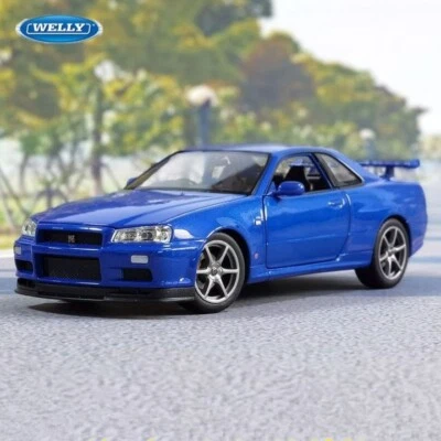 Coche modelo diecast Welly 1/24 Nissan Skyline R34 GT-R edición especial azul Foto 1 de 4