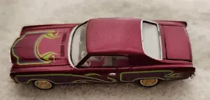 70 Chevy Monte Carlo Monte Carlo Lowrider Impala Revell 1:64 rosso con bordo verde - Foto 1 di 7