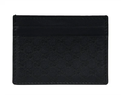 Cartera para tarjetas Gucci entrelazada logotipo GG azul marino cuatro tarjeteros cuero Foto 1 de 4