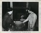 1956 Press Photo State Reinforcement Agents Examine Barrels of Yeasty Mash
