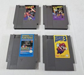 T-121 VINTAGE NINTENDO NES GAME LOT - SOLOMONS KEY RYGAR MARIO 3 & MORE