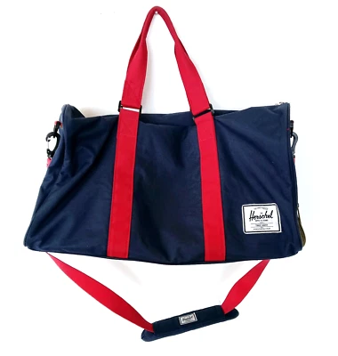Herschel Novel Duffel Bag Large (12x20x11) Navy & Red Strap W/ Woodland Camo - Image 1 of 4
