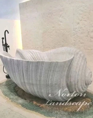 Bañera italiana de lujo en forma de conchazón marino de mármol Calacatta. Suministro limitado Foto 1 de 4