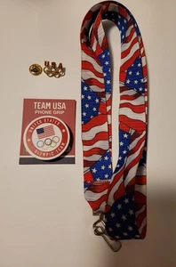 TEAM USA CORDINO IMPUGNATURA TELEFONO E SPILLA OLIMPICA USA - Foto 1 di 1