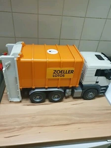 Müllwagen Brüder CE 2009(MAN).Zustand Ist Ordnung ,nur leider fehlt eine Türe. - Bild 1 von 6