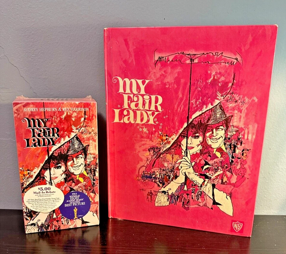 MY FAIR LADY Photo Book 1964 + VHS Factory Sealed 1991 Audrey Hepburn Lot of 2 Foto 1 de 4