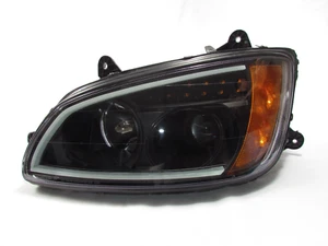 Faro de proyector negro con barra LED para Kenworth T660 - lado del conductor - Imagen 1 de 3