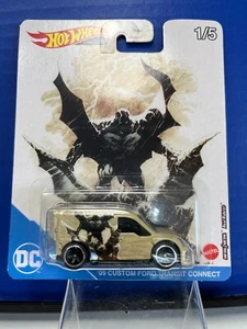 1/64 HOT WHEELS PREMIUM DC COMICS '09 CUSTOM FORD TRANSIT CONNECT 1/5 TAN - Picture 1 of 2