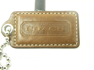 2.5" Grande COACH MARRÓN CUERO LLAVERO BOLSO ENCANTO LLAVERO ETIQUETA COLGANTE Foto 1 de 3