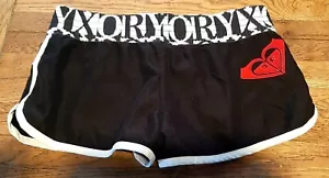 PANTALONES CORTOS ROXY SURF ROJO NEGRO Y BLANCO TALLA 3 - Imagen 1 de 7