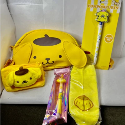 Sanrio Pompompurin 5 Pc Gift Set Bag Coin Purse Socks Pens - Image 1 of 4
