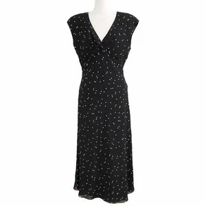 VESTIDO MAXI FORMAL JOSEPH RIBKOFF NEGRO BLANCO LUNARES SIN MANGAS CUELLO EN V - 8 - Imagen 1 de 9