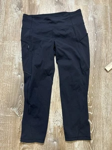 Lululemon Legging Damen 8 Run on schwarz kurz Reißverschluss gebraucht, in einwandfreiem Zustand - Bild 1 von 8