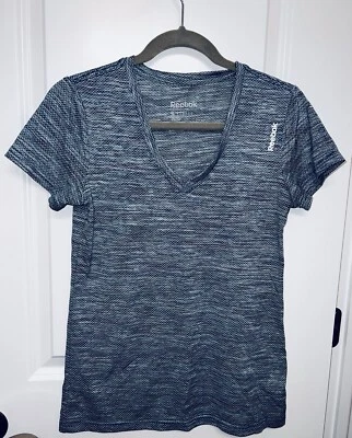 Top de entrenamiento Reebok Performance para mujer con cuello en V talla pequeña Foto 1 de 4
