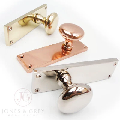 SOLID BRASS NEW YORK STYLE ROUND DOOR KNOBS HANDLES ON LONG BACKPLATE - Image 1 of 4