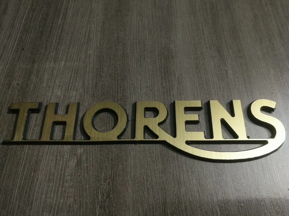 LOGO THORENS, PVC doré, épaisseur 1.6 mm, dimension  107 x 25 mm - Photo 1/4