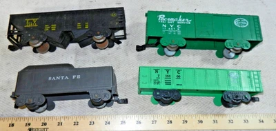 4 Marx Plastic 4 Wheel Freight Cars: Tender + Boxcar + Hopper + Gondola - Image 1 of 4
