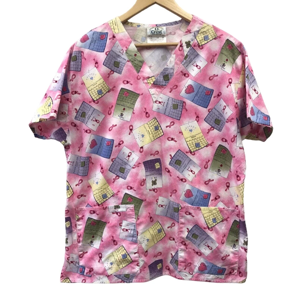 Crest Scrub Top Womens Medium Breast Cancer Pink Ribbon White - Image 1 of 4