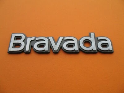 96 97 98 99 00 01 OLDSMOBILE BRAVADA TAPA TRASERA EMBLEMA LATERAL LOGOTIPO INSIGNIA SIGNO A11794 Foto 1 de 3
