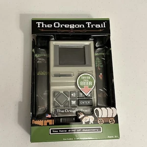 THE OREGON TRAIL Electronic Handheld Retro Classic Computer Video Game BRAND NEW - Picture 1 of 6