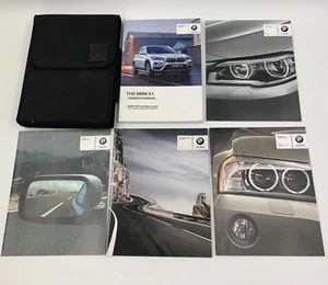 2017 BMW X1 Owners Manual Set with Case OEM E04B43035 - Picture 1 of 8