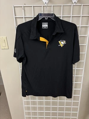 Camisa polo Pittsburgh Penguins tamanho grande. Manga curta. Poli/elastano 85/15. Excelente estado usado - Imagem 1 de 4