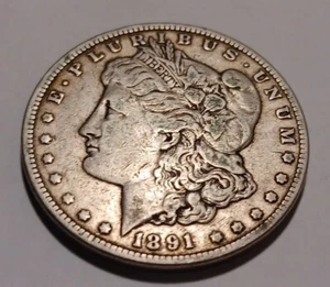 1891 CC Morgan Silver Dollar  - Picture 1 of 4