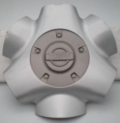 Nissan Pathfinder 1999-2002 pintado plateado OEM tapa central P/N 40342-2W600 Foto 1 de 4