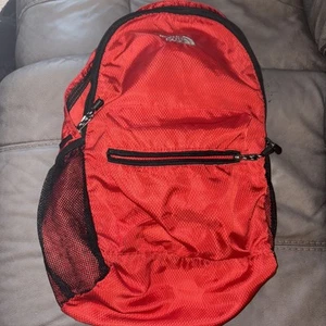The North Face Self Folding Backpack Travel Pack Red Pocket - Picture 1 of 4