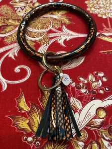 BRAND NEW FAUX LEATHER WRISTLET KEYCHAIN WITH TASSEL BRONZE PRINT COLOR GOLD - Picture 1 of 1