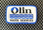 OLIN WATER SERVICES EMBROIDERED SEW ON PATCH CHENICALS AMMUNITION 3 1/2 x 2" NOS
