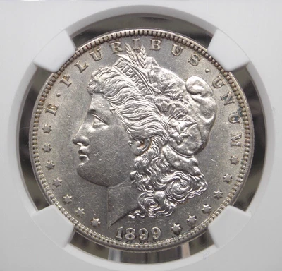 1899/99 "S" Morgan SILVER Dollar VAM-7 $1 NGC AU58 #002 About Unc ECC&C, Inc. - Image 1 of 4