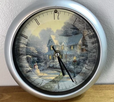 Reloj de pared Thomas Kinkade Christmas Carol Music activado en hora de lectura Foto 1 de 4