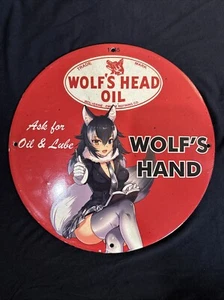 VINTAGE WOLF’S HEAD OIL PINUP GIRL PORCELAIN GAS OIL MOTOR LUBE GARAGE PUMP SIGN - Picture 1 of 5