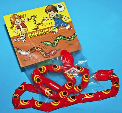 HONG KONG - EINZINGER BESTAND ALTE GLIEDERSCHLANGE GELENKSCHLANGE TRICKSCHLANGE SCHERZARTIKEL KINDHEIT 80s ROT