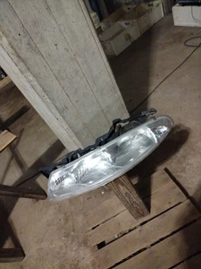 1997 Oldsmobile Aurora Driver Headlight - Bild 1 von 2