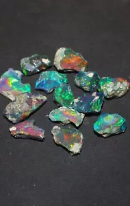 Schwarzer Opal grober Edelstein, Großhandel Multi Feuer roher schwarzer Opal Kristall 10 Stück Posten - Bild 1 von 3