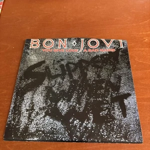 OPENED- MERCURY RECORDS- BON JOVI "You Give Love A Bad Name" 7” 45 SINGLE - Foto 1 di 6