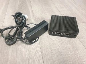 Mini PC sin ventilador Intel Atom E3845 4 LAN pfSense Firewall AES-NI 4 GB RAM 64 GB SSD - Imagen 1 de 5