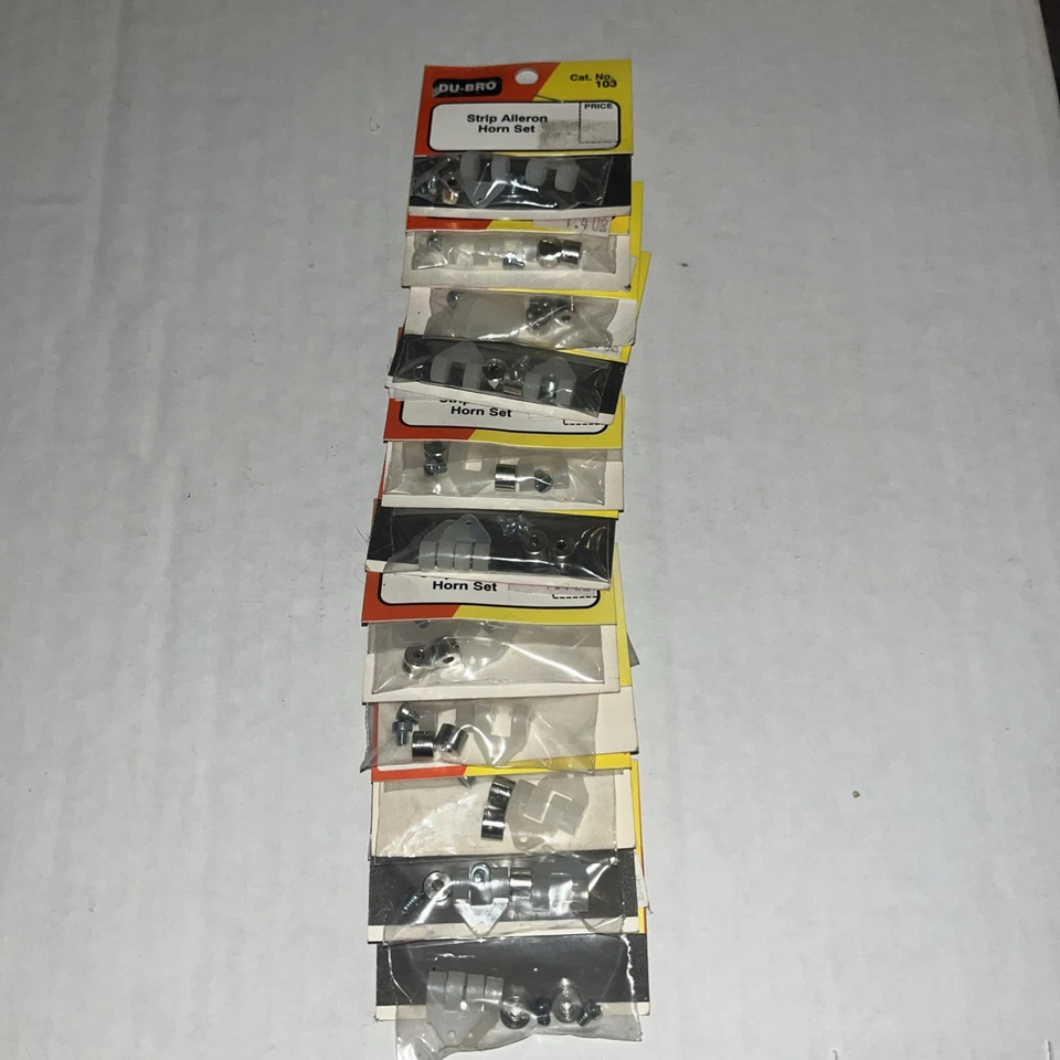 Lot of 11 Dubro 103 Strip Aileron Horn Set • - Image 1 of 1