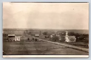 Postcard Unidentified RPPC, Dirt Road, Farm, Windmill, Church, Houses, Barns - Picture 1 of 2