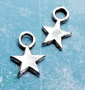 10 pieces - Antique Silver Solid Tiny Star Tibetan Charms Pendants Dangle - Picture 1 of 1